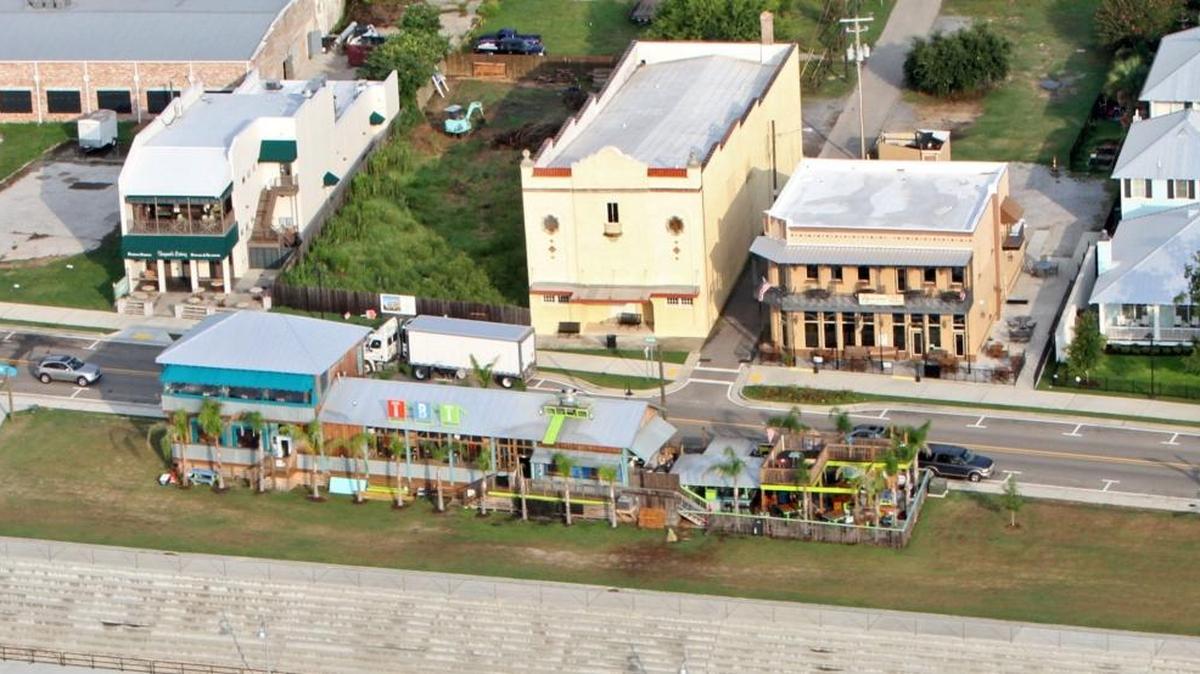 The old A&G Theatre on North Beach in Bay St. Louis, center, in 2015, is surrounded by restaurants, Trapani's on the left, 200 North Beach, right and the Blind Tiger across the street.