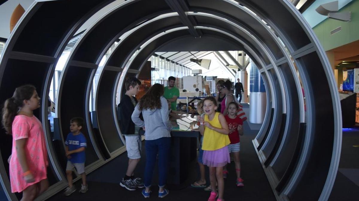 The new Electromagnetic Spectrum Table at Infinity lets visitors have hands-on fun learning about the science of rays.