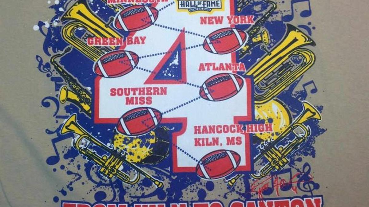 The Hancock High School Band is selling T-shirts to help them raise funds to make it to Canton, Ohio, for Brett Favre’s induction into the Pro Football Hall of Fame.