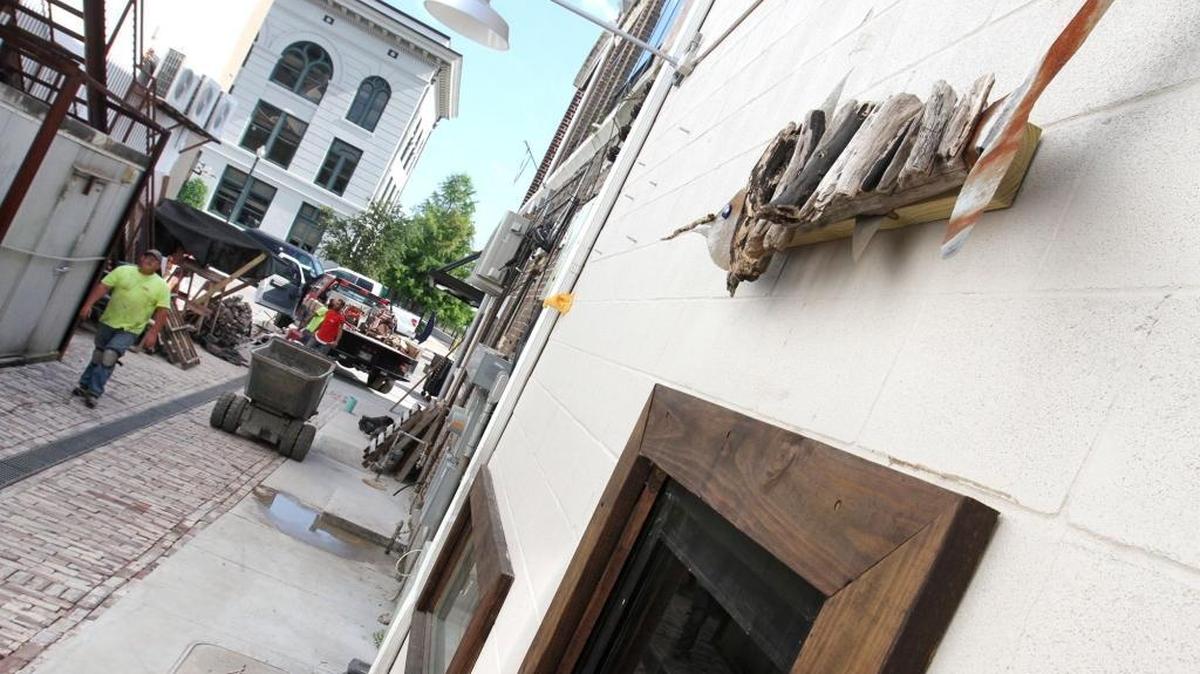 Gulf Breeze Landscaping of Gautier should finish paving Fishbone Alley in downtown Gulfport by Friday. Brick pavers from downtown circa 1906 were saved and have been used in the pedestrian alley that runs behind restaurants and bars.