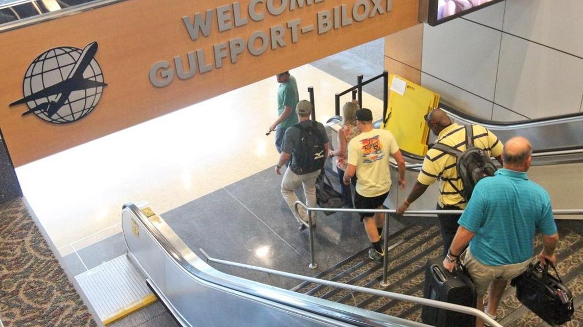 Passengers walk to the baggage claim area of Gulfport-Biloxi International Airport in Gulfport on Monday June 22, 2015.
