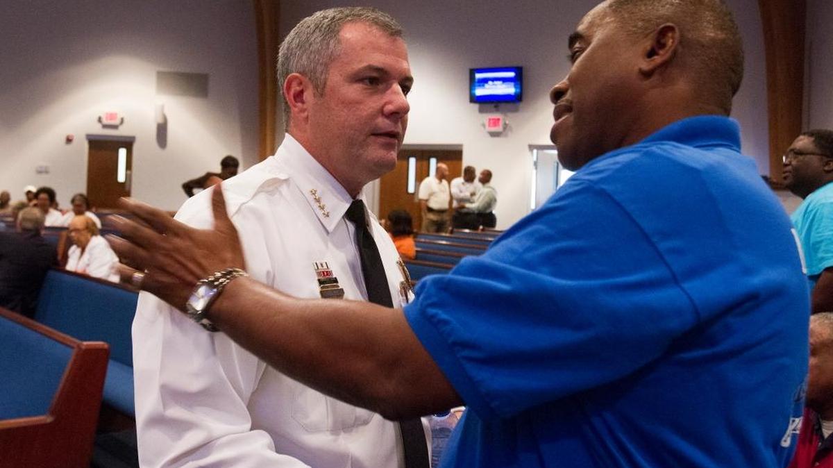 Gulfport Police Chief Leonard Papania talks with Mount Bethel Baptist Church Pastor J. C. Wilkes during a forum with the community in 2014. The police will be at Mount Bethel again Tuesday for a Town Hall to help improve encounters between the police and the citizens.