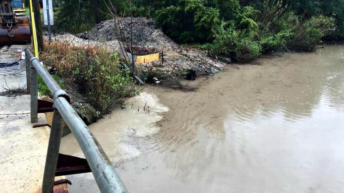 One of numerous photos submitted with a lawsuit filed by the Gulf Restoration Network against Oscar Renda Contracting Inc. shows Bayou Auguste at the Lee Street bridge in East Biloxi. The lawsuit says the area has been without perimeter controls to prevent sediment runoff into the bayou during a massive East Biloxi public works project.