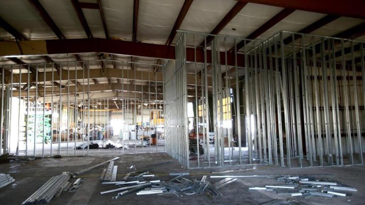 The Salvation Army of the Mississippi Gulf Coast is renovating this metal building on U.S. 49 at Polk Street for its Family Store, a thrift store, and the first of several buildings planned for the 5.2 acres.