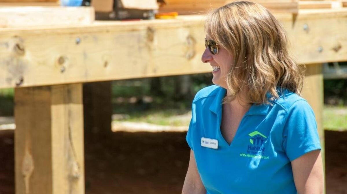Lindsay Freise Avery, director of resource development at Habitat for Humanity’s Gulfport office, supervised the work on Tuesday.