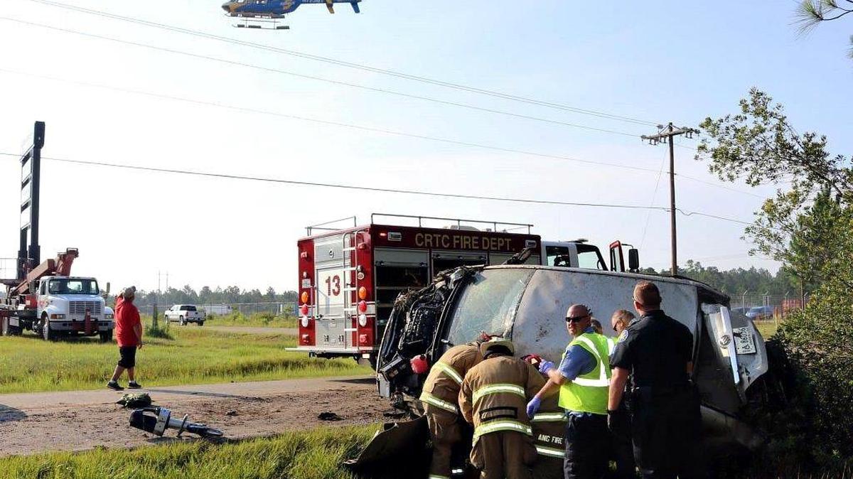 Rescue 5 helicopter responds to the scene of an accident Sunday, July 9, 2017 as fire crews extricate one of the drivers, who was flown to University of South Alabama Trauma Center.