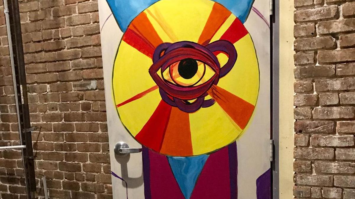 Kelsey Wishik painted this door in Fishbone Alley that leads to 13th Street Jazz Bistro in downtown Gulfport.
