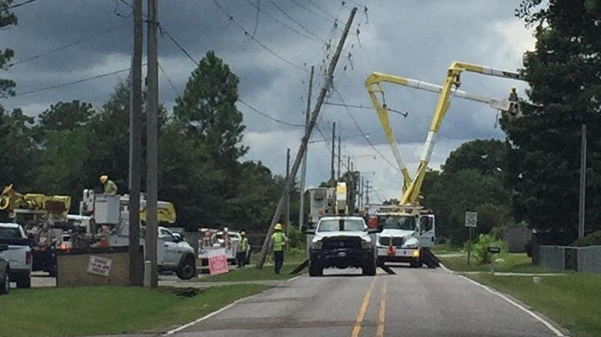 Parts of Klein Road will be closed for several hours Friday afternoon after a garbage truck brought down a utility pole.