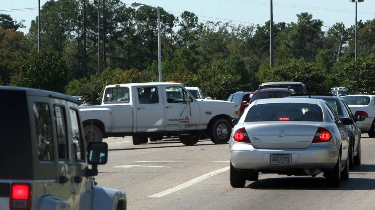 This file photo shows traffic in D’Iberville was was already busy thanks to Walmart and the stores surrounding the retail giant and increased when The Promenade opened in 2009. The diverging diamond intersection near the back entrance to The Promenade was designed to move heavy traffic more efficiently. Now continuing road construction will again slow traffic in the area.