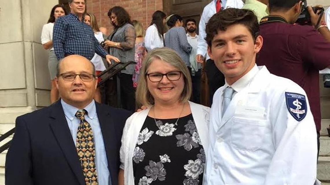 Andrew Strachan was joined at his white coat ceremony, marking his entry into medical school, by foster parents Roddy and Lucy Russell of Gulfport, whom he now calls mom and dad. Strachan met the Russells at First Presbyterian Church in Gulfport shortly before being placed in the Harrison County Emergency Children's Shelter. They became certified as foster parents so that Andrew could live with them and pursue his dream of attending medical school.