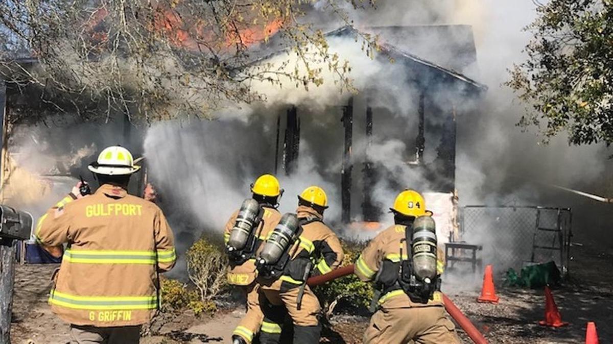 The Gulfport Fire Department is battling a housefire on Dixie Street in downtown Gulfport.