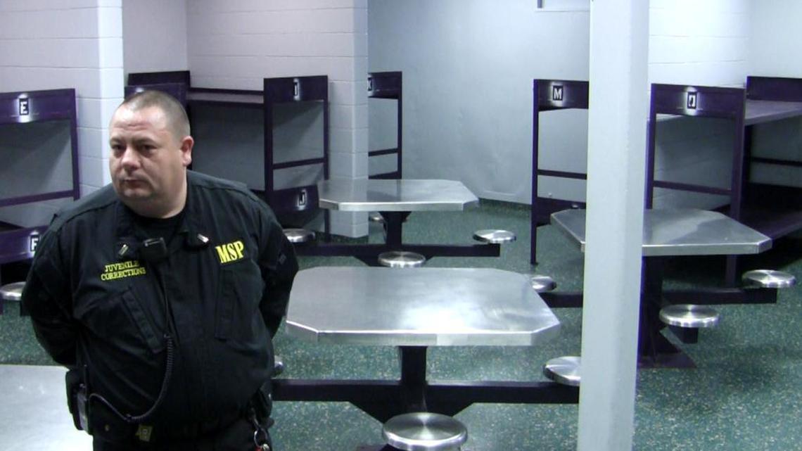 Corrections officer Lt. Jimmy Warden of Mississippi Police Security, stands inside of of the day rooms at the Harrison County Juvenile Detention Center in Biloxi in 2009.