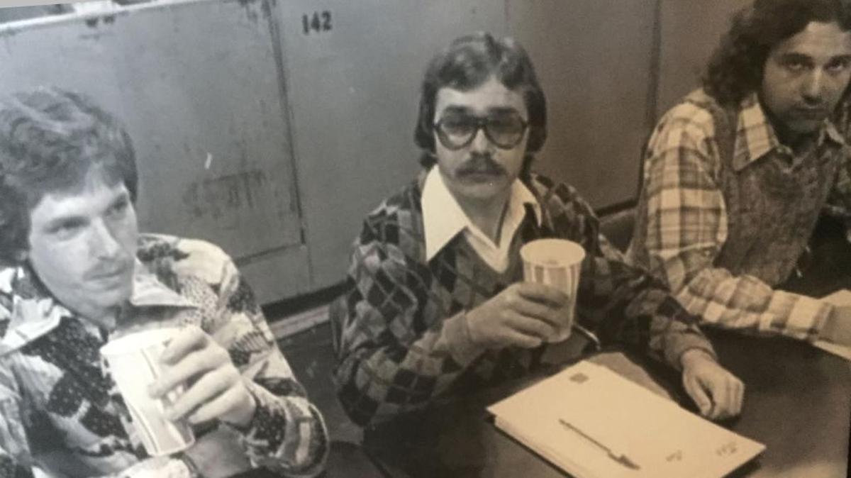 Former South Mississippi Sun Sports Editor Roy Rolison, center, covers a basketball game with Cliff Kirkland, left, and John Bialas. Rolison died Aug. 26, 2017, at 67.