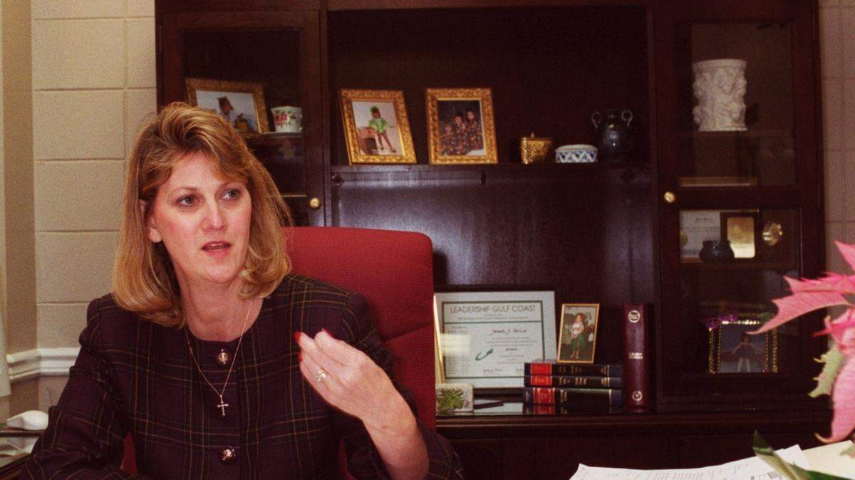 Harrison County administrator Pam Ulrich says she keeps a tight reign on the county's $1 million escrow account, which bought among other things the credenza in her office, background.