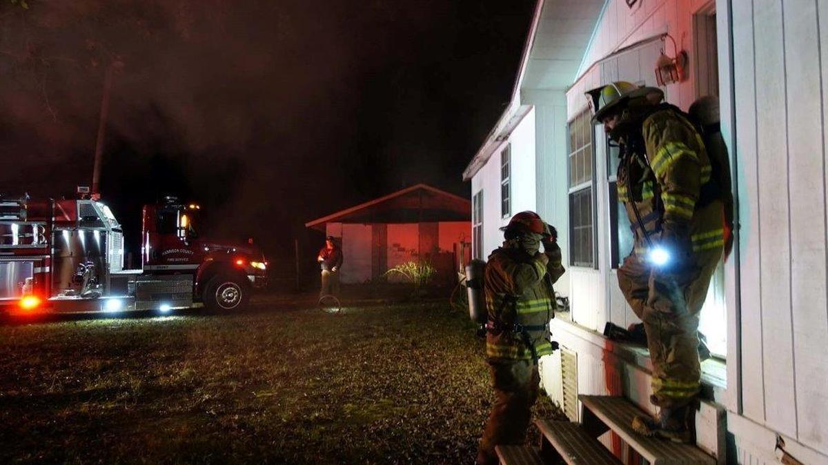 Harrison County firefighters battle a blaze at a vacant house on Old US 49.