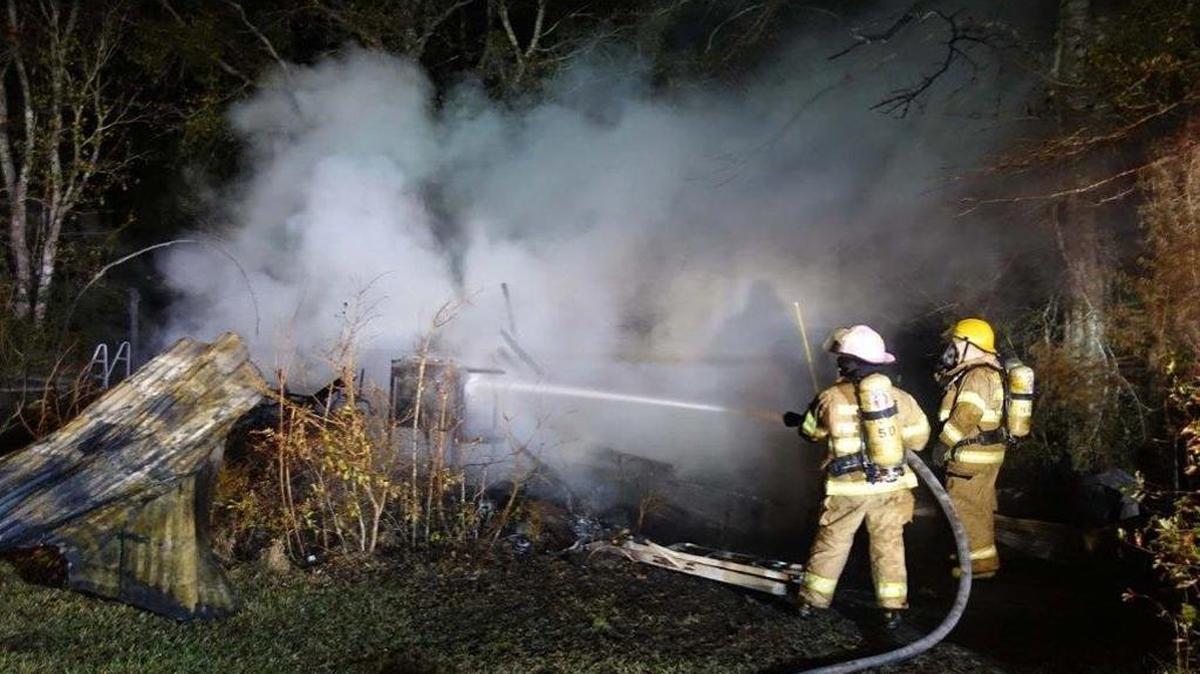 A storage building was destroyed and a nearby home received heat damage in a Harrison County fire Thursday night.