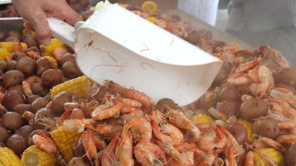 Boiled shrimp with potatoes and corn is at the top of the menu at the Biloxi Blessing of the Fleet Fais Do-Do at Point Cadet Plaza on Saturday, June 3, 2017.