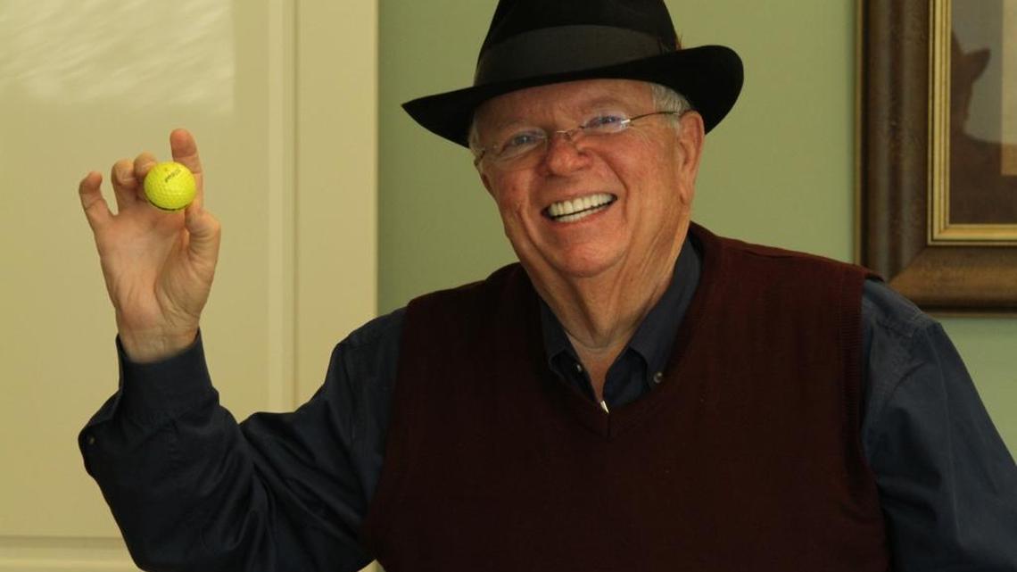 Realtor Lenny Sawyer shows off a souvenir — one of the many golf balls that rained down on his 14th Street building in downtown Gulfport early Saturday. Police responded to what they thought might be a burglary, but found the street, and Sawyer’s roof, littered with golf balls.