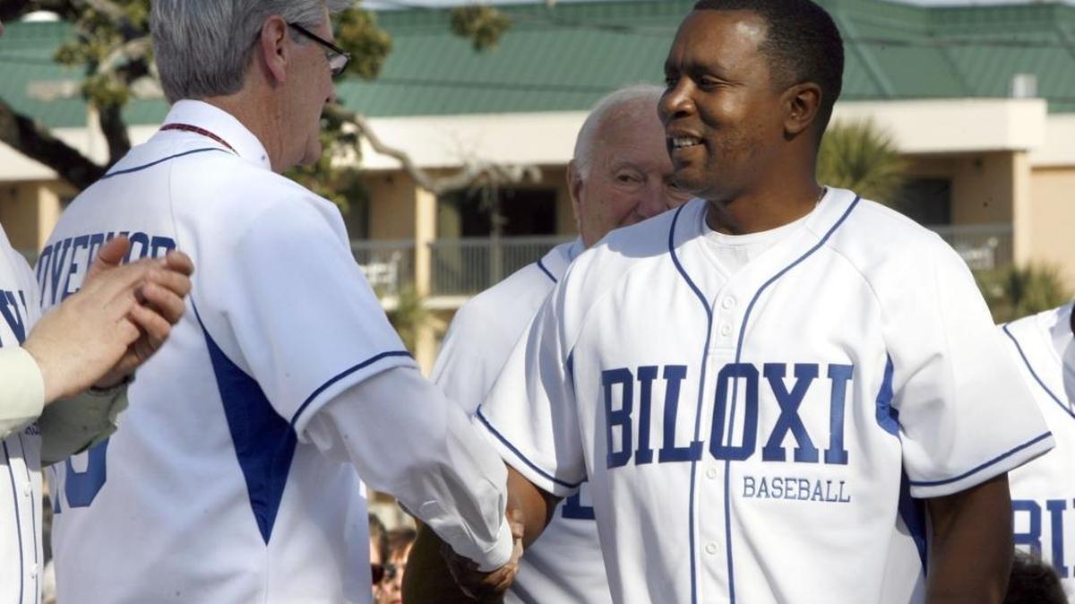 Gov. Phil Bryant and Tim Bennett shake hands at the ground breaking ceremony for MGM Park, the Biloxi minor league baseball stadium, in January 2014. The City of Biloxi is now suing Bennett over its share of ticket sales from the Conference USA Baseball Tournament games at MGM Park in May.