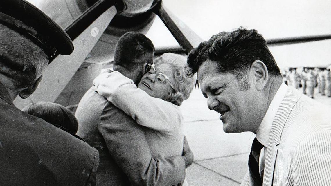 Astronaut Fred Haise is hugged by his mother and greeted by then-Biloxi Mayor Danny Guice after arriving at Keesler Air Force Base in Biloxi in 1970.