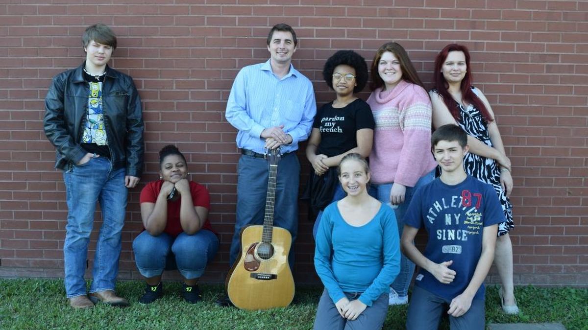 Students in the West Harrison High School Choir and their director, Curtis Staples, make final preparations to sing with Foreigner on Friday at the IP Resort Casino. The school was the winner of the Sun Herald Sing With Foreigner Contest.
