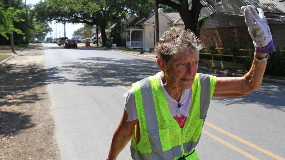 Doris Witchen of Pascagoula waves to a passing motorist as she walks down Live Oak Avenue in Pascagoula in June, 2011. Witchen was 84 when the Sun Herald did a profile story on her.