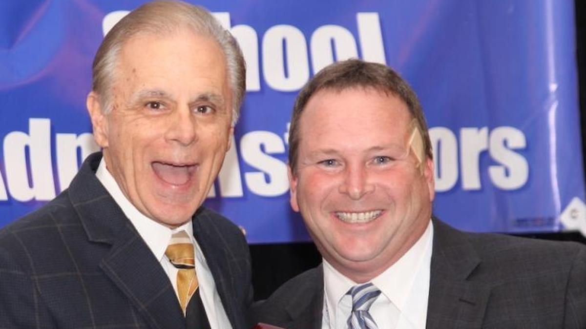 Barry Amacker, left, with Mississippi Association of School Administrators President Ray Morgigno.
