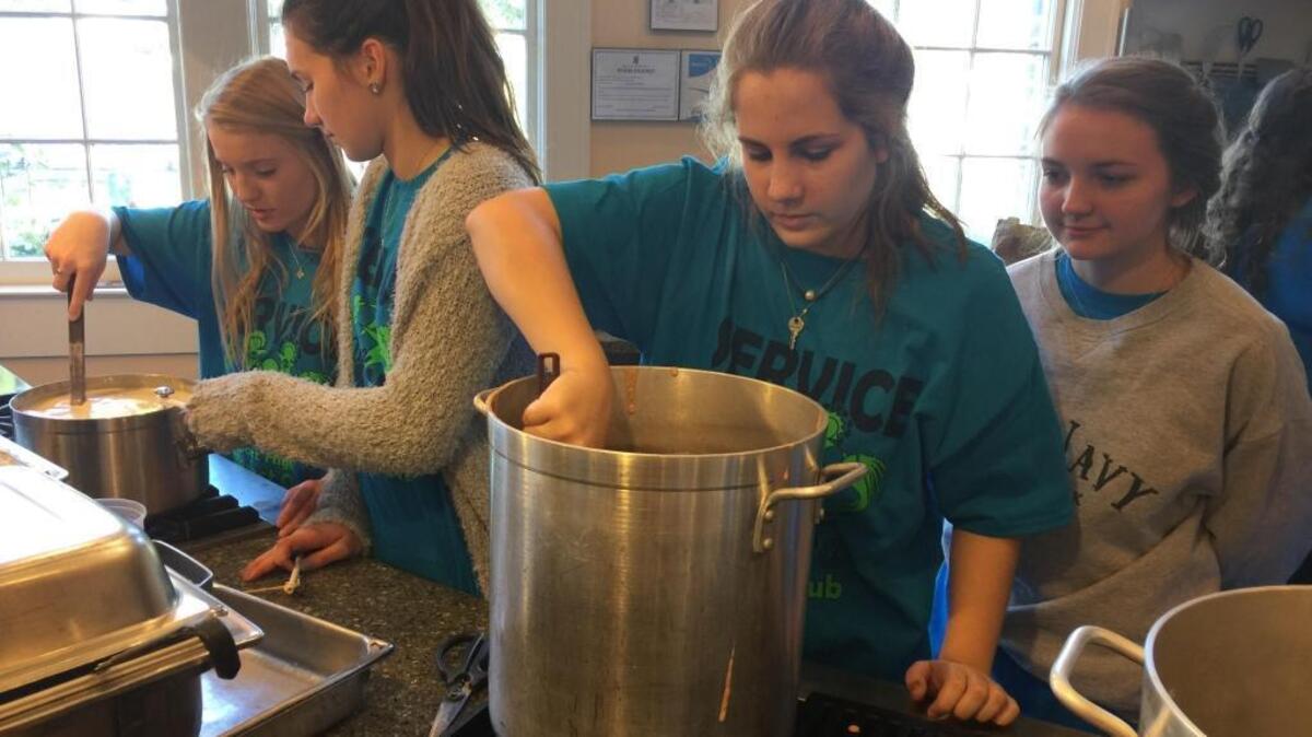Students with the Gulfport High School Interact Club serve bowls of soup such as Mary Mahoney’s seafood gumbo and vegetable soup from the Beau Rivage to patrons at the Empty Bowls benefit at the Mary C. O’Keefe Cultural Center in Ocean Springs on Saturday, Nov. 19, 2016.