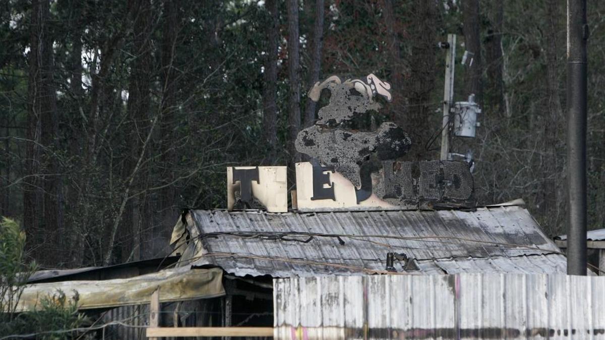 A burned pig is one of the few things that remained of The Shed restaurant after the structure burned in February 2012.