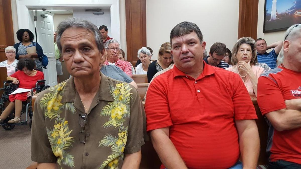 Danny Williamson, left, and Slade White, with Mari Signum, gave up trying to convince Pascagoula City Council that cooking shrimp hulls to produce chitin won’t create unmanageable smells for neighbors.