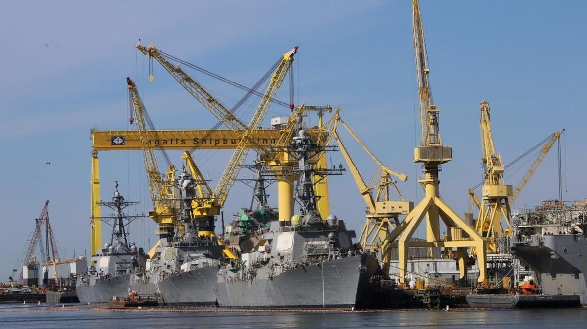 Arleigh Burke-class destroyers USS Ralph Johnson (DDG-114), USS Delbert D. Black (DDG-119) and USS Paul Ignatius (DDG-117) under construction at Ingalls Shipbuilding in Pascagoula on Friday, Jan. 19, 2018. The Ralph Johnson is about to set sail from Ingalls for Charleston, South Carolina, where it will be the latest Arleigh Burke-class destroyer commissioned into the U.S. Navy fleet on March 24.