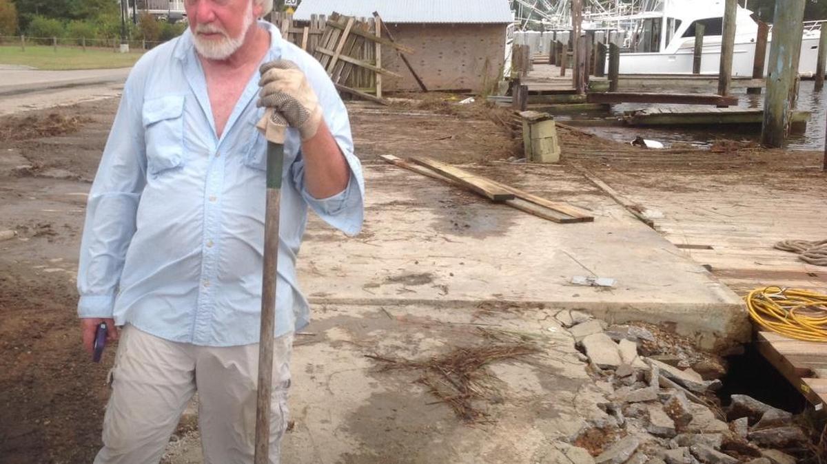 Kenny DiNero, owner of the bait shop at Ocean Springs Harbor, was disheartened Monday when he looked at the damage to his business, even though he had spent three days packing and moving.