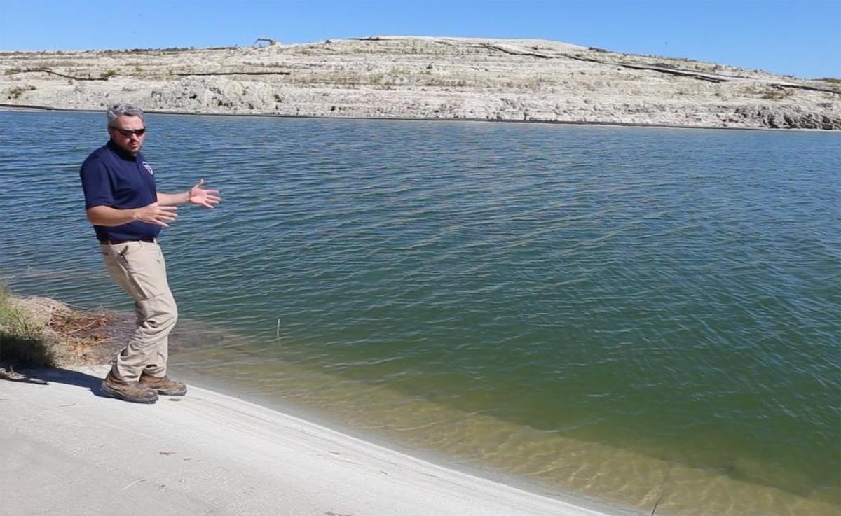 An on-site coordinator for the Environmental Protection Agency at the Mississippi Phosphates plant in Pascagoula talks in 2017 about a heavy rain event forced them to take drastic measures to contain water at the east gypsum stack.