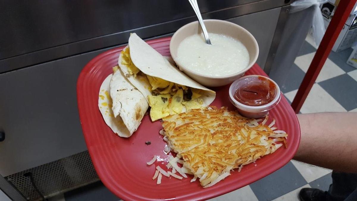 Buzzy’s breakfast taco includes hash browns, salsa and grits.