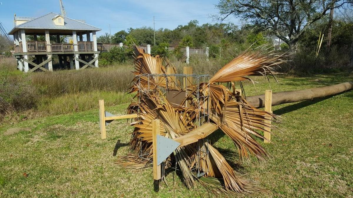 An osprey nest bed waiting to go up at Magnolia Birding Pier is one of 10 being erected around Pascagoula. It is attached to a 40-foot pole, has a wire top and palmetto fronds to help the birds get started.