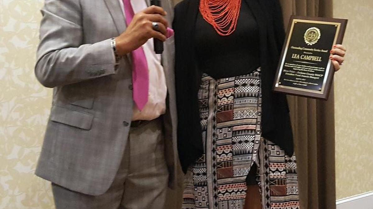 Lea Campbell, right, founder of the social-justice organization Mississippi Rising, accepts the Moss Point Jackson County NAACP’s Outstanding Community Service award from President Curley Clark during the group’s Freedom Fund Banquet in Pascagoula on Friday, April 21, 2017.