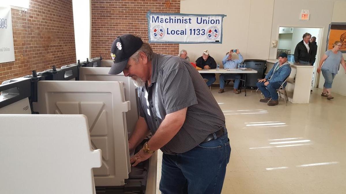 David Caillavet, with the Pipefitters Local 436, casts his vote Tuesday morning on whether to approve a contract extension with Ingalls shipyard in Pascagoula.