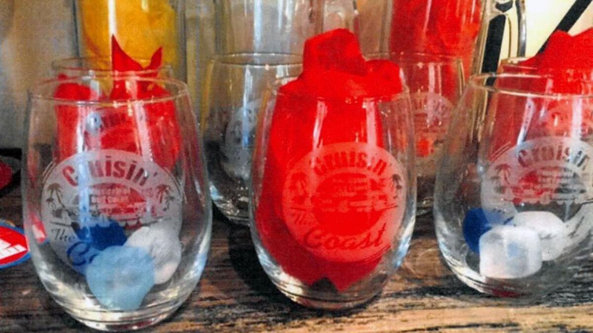 A trademark-infringement lawsuit Cruisin' The Coast filed against Blessons gift shop in Ocean Springs includes this photograph of etched glasses allegedly being sold there.