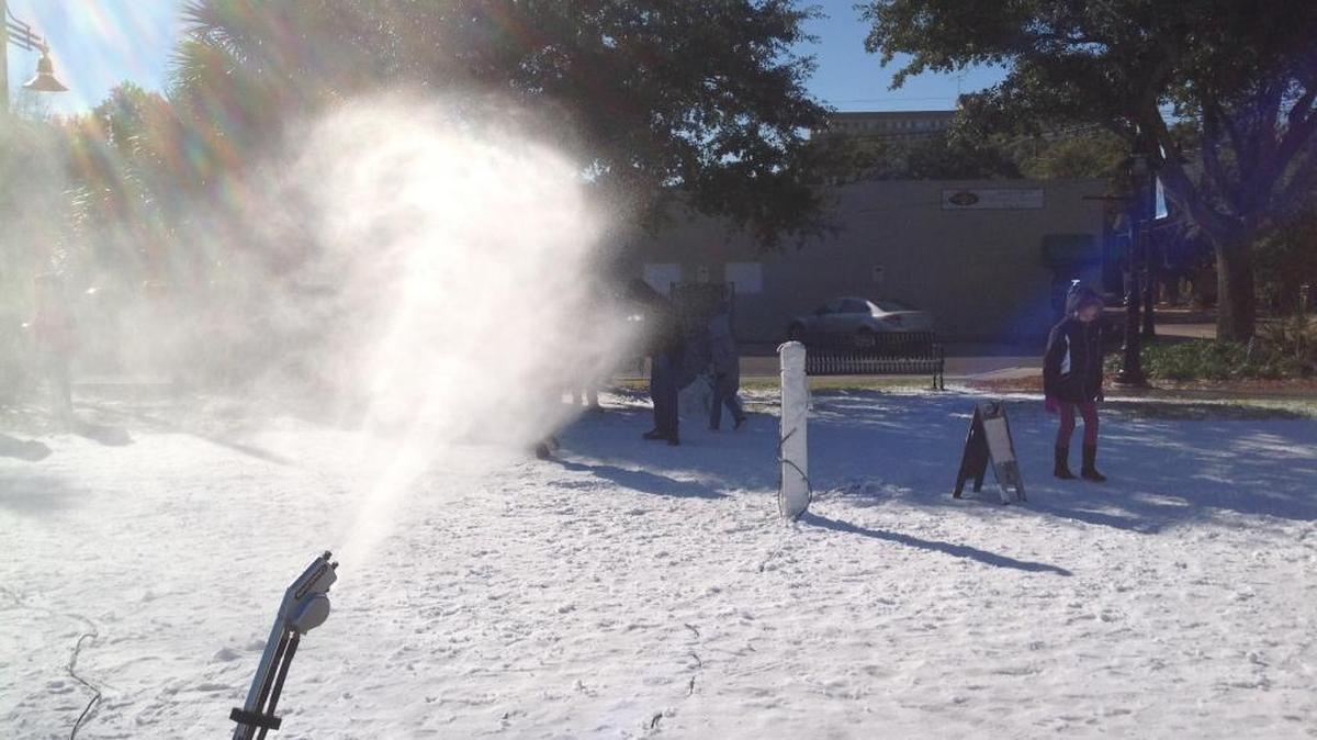 Snow is on the way to Ocean Springs, where snow is blowing in the parking lot next to the train depot, as it did in this photo taken in January 2015. Cold temperatures may allow fresh snow each day this week.