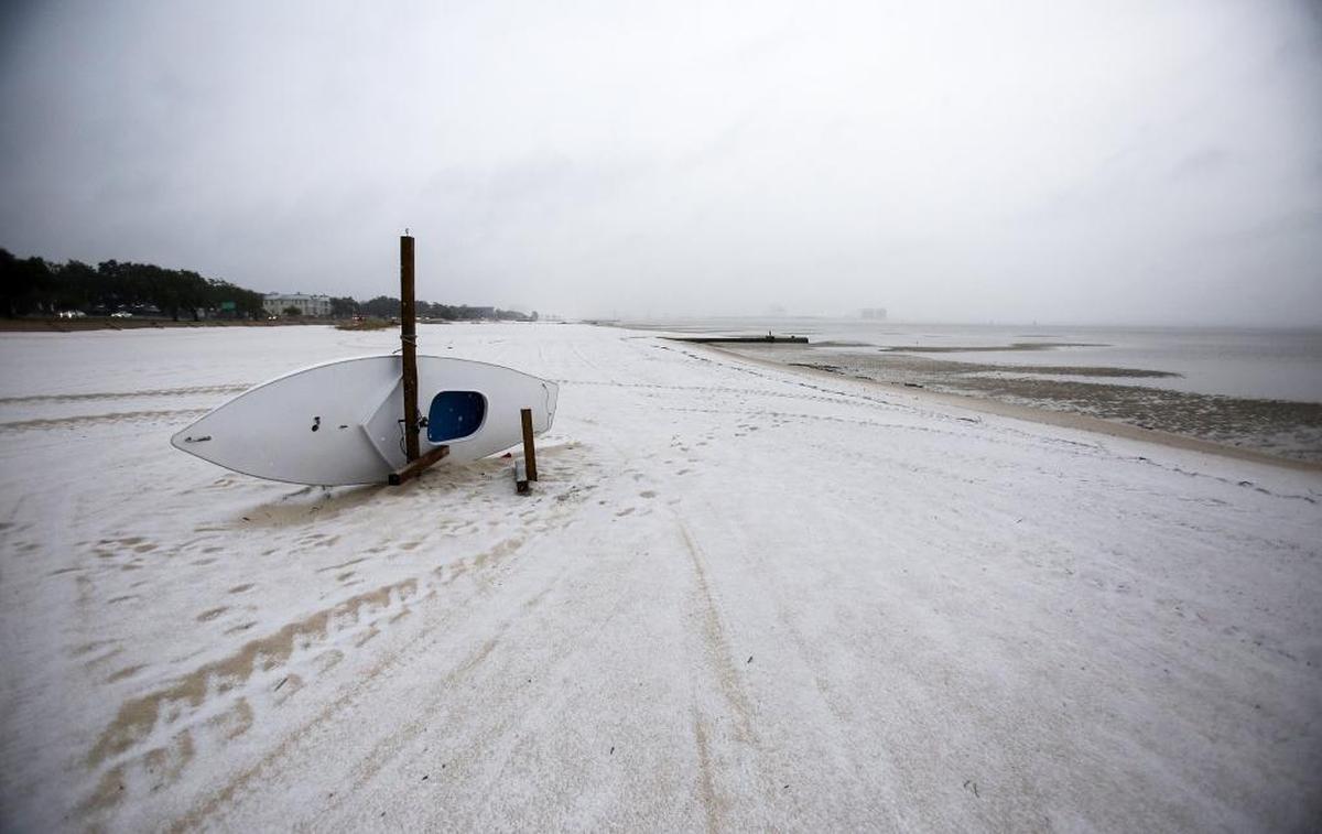 A light coat of snow covers the beach in Gulfport after a short round of flurries on Friday, Dec. 8, 2017. Snow fell in South Mississippi throughout the day with the majority falling in the Pine Belt. Photographer’s comments: It’s not everyday it snows on the beach in Mississippi.
