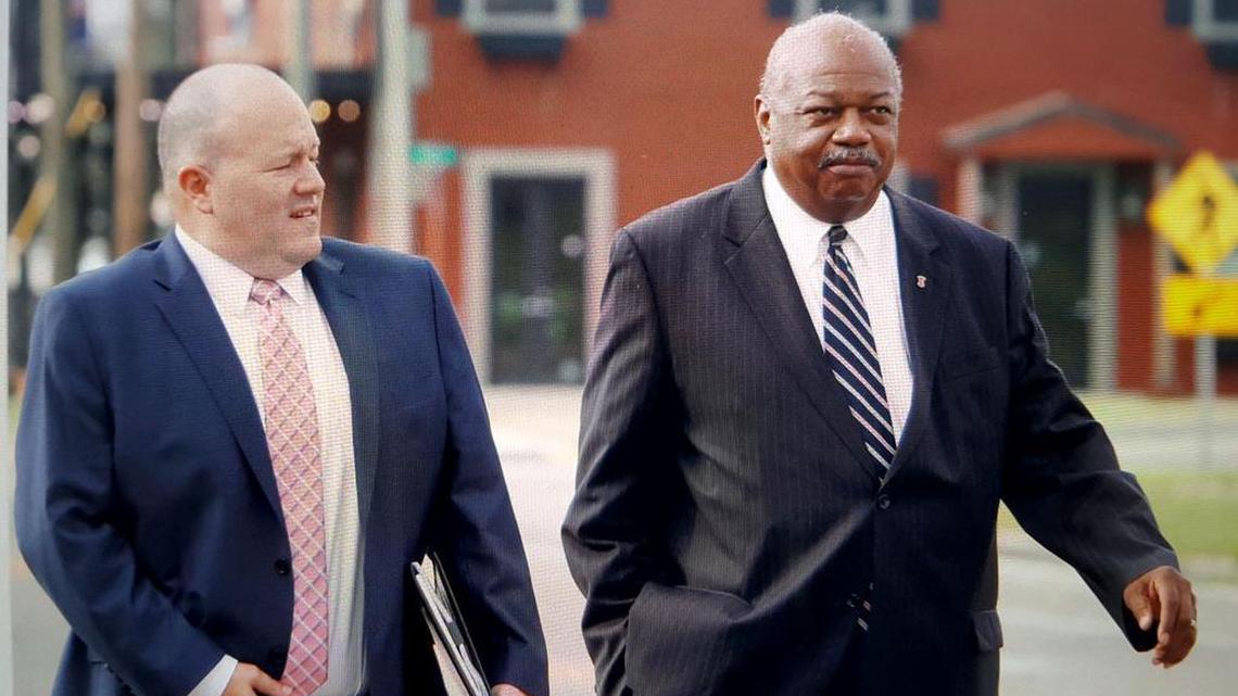 Business consultant Robert Simmons, right, and his attorney, K.C. Hightower, walk to the Dan M. Russell, Jr., federal courthouse in Gulfport on Thursday, Sept. 15, 2016, for his sentencing on a federal bribery charge in the public corruption case that involves former state corrections Commissioner Chris Epps and former Harrison County Supervisor William Martin.