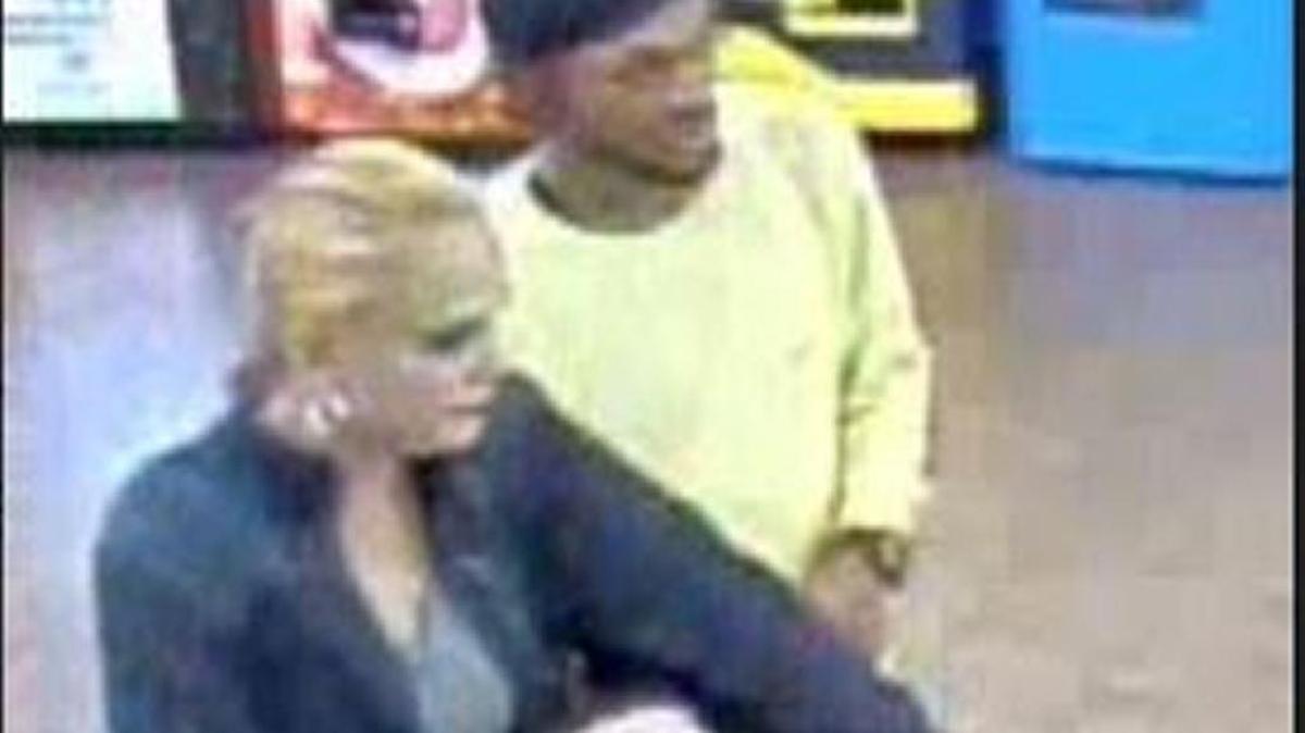 Police want to identify this couple, suspected of using a victim's credit card at Super Walmart on Nov. 27.