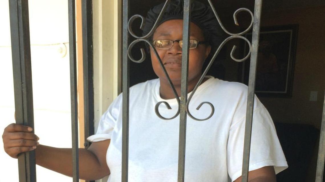 Biloxi resident Tonya Pruitt keeps the three children she babysits indoors because of recent shootings at the apartment complex across the street on Rodenberg Avenue north of the railroad tracks.