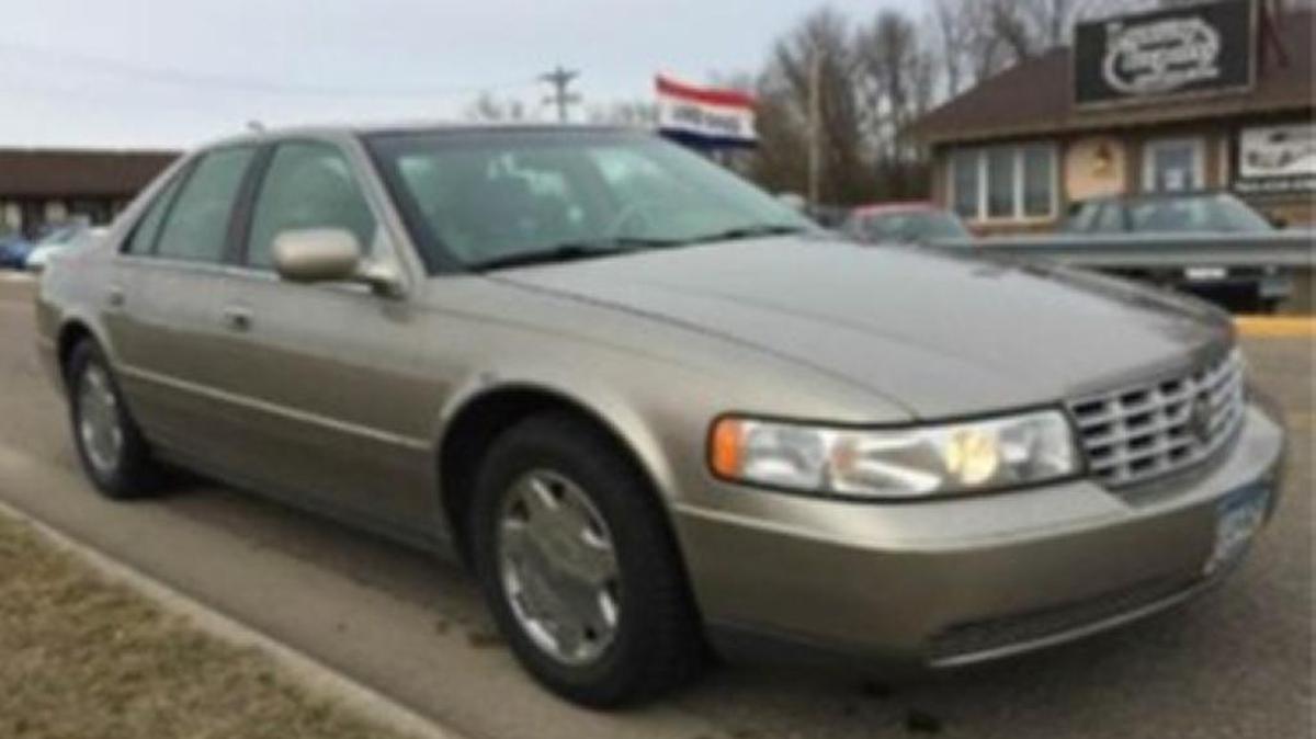 The Jackson County Sheriff's Office says alleged killer Thomas Stafford Elliott, 40, was driving a Cadillac stolen from a man found dead in a freezer. The Sheriff's Office says the gold 2001 Cadillac Seville SLS, like the one pictured, has an Indiana license plate reading, "859RAT." It has been found in Alabama.