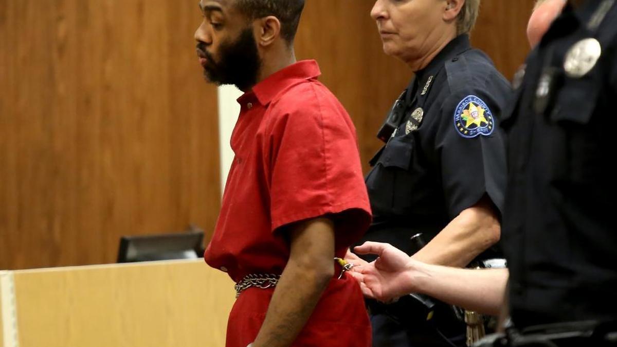 J’uan Holloway is escorted into the courtroom for his preliminary hearing on Tuesday, July 19, 2016, in Gulfport. Holloway is charged with capital murder in the death of 19-year-old Raymond Howze III.