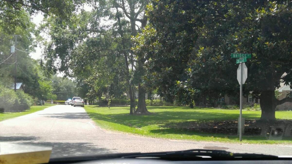 Police respond to a shooting on College Street in Gulfport on Saturday, May 27, 2017.