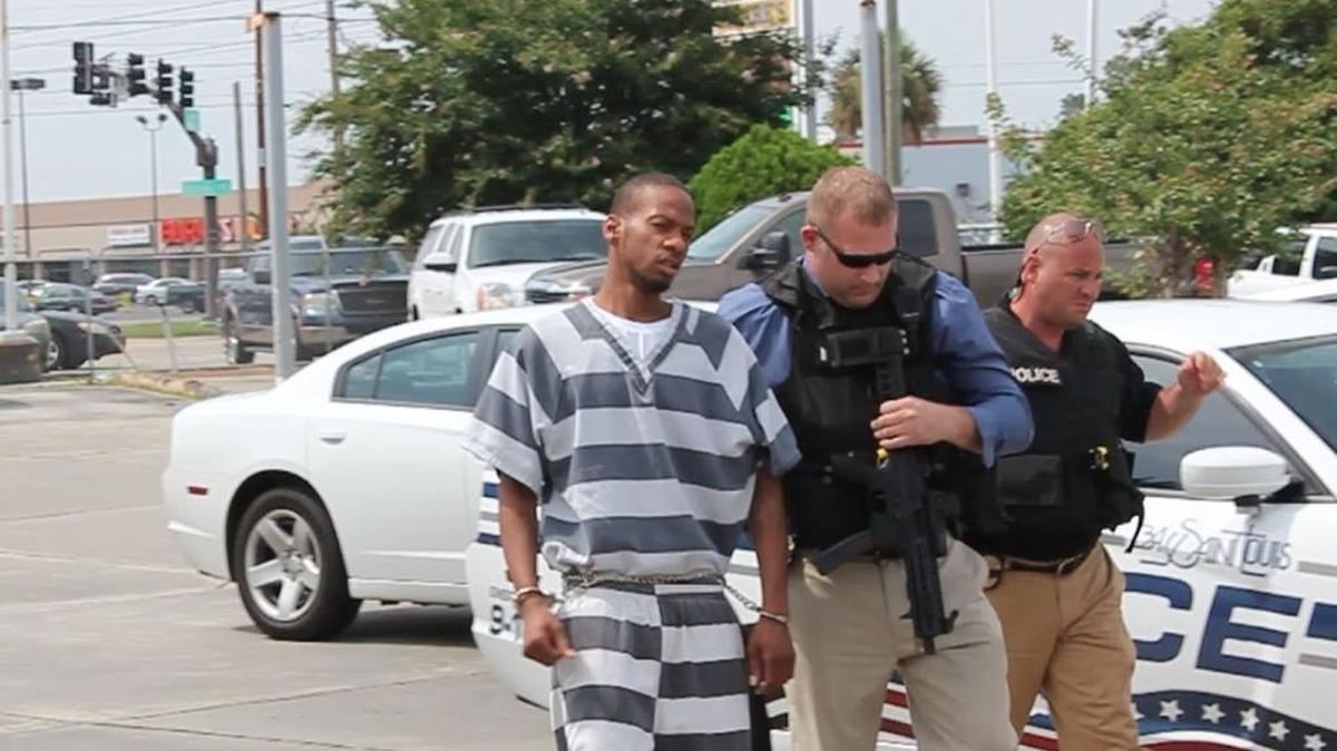Myrick Leneaux enters the Bay St. Louis Municipal Court on Wednesday to make an initial appearance on two counts of murder and an auto theft charge in connection to a double homicide on July 30.