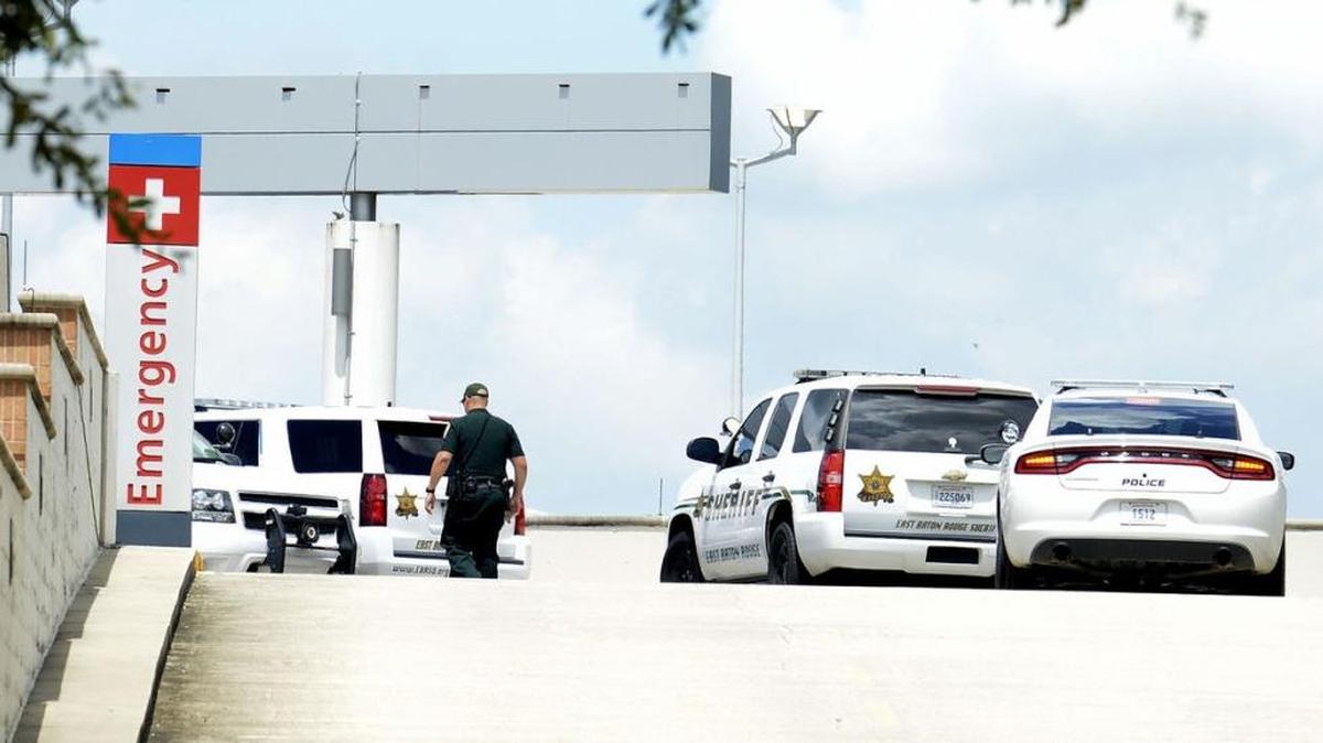 Baton Rouge police and the East Baton Rouge Sheriff’s Office on scene at the entrance of Our Lady of the Lake’s emergency room on Essen after multiple officers were shot Sunday morning.