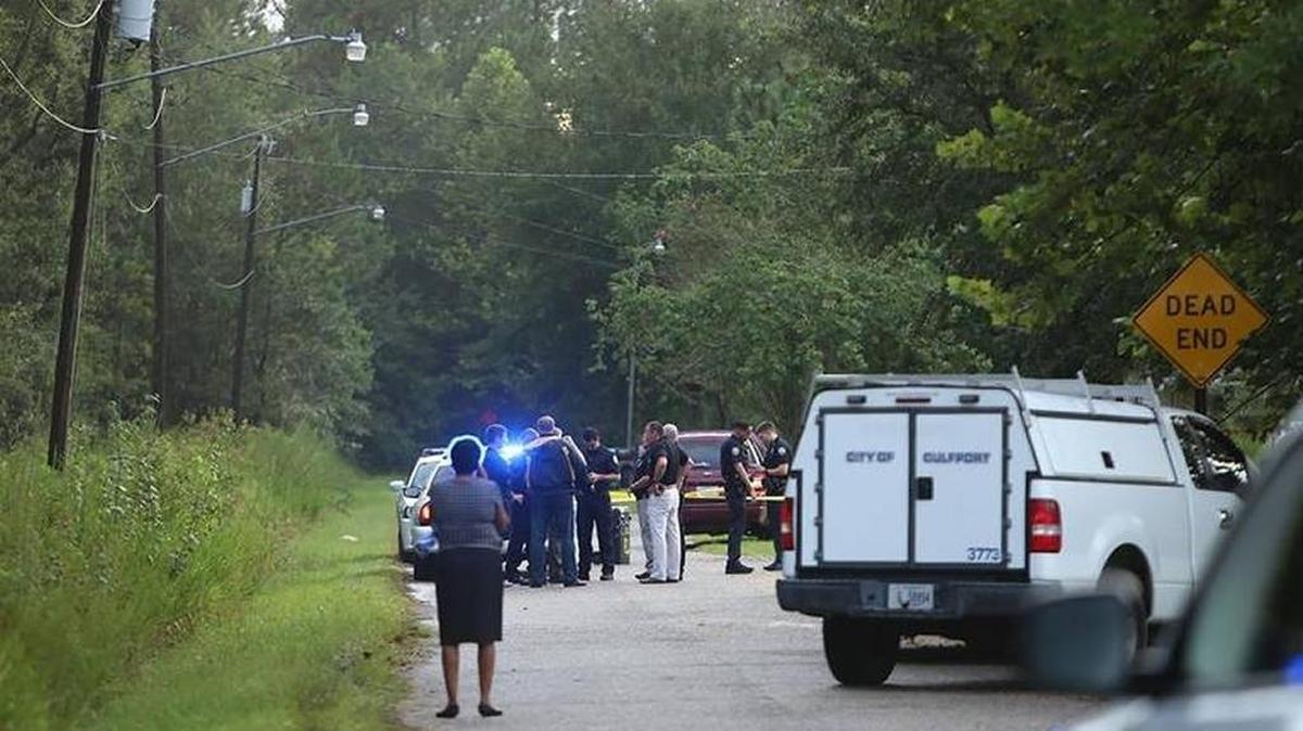 Gulfport police gather at a home in the 3600 block of Sabine Street on Friday after a 6-year-old boy was shot in the stomach and died.