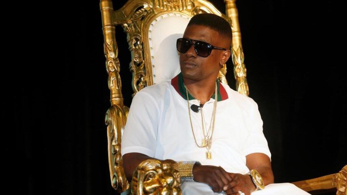 Boosie Badazz, then known as Lil Boosie, wears some of his trademark jewelry during a 2014 news conference in New Orleans.